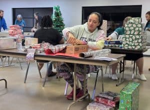 Stephanie Pritchett wraps presents for her 11-year-old daughter Sophiella