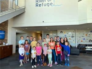 River of Refuge took a group shot of the homeschool volunteers who cleaned at River of Refuge on May 13 and captured them at work and play