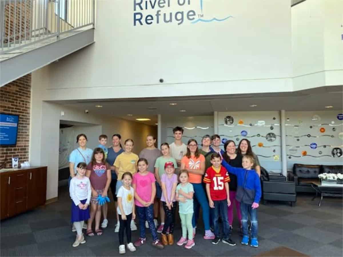 River of Refuge took a group shot of the homeschool volunteers who cleaned at River of Refuge on May 13 and captured them at work and play